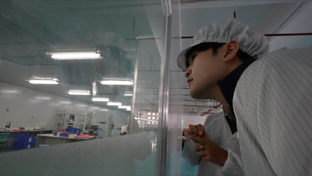 Visiting a manufacturing facility in protective clothing